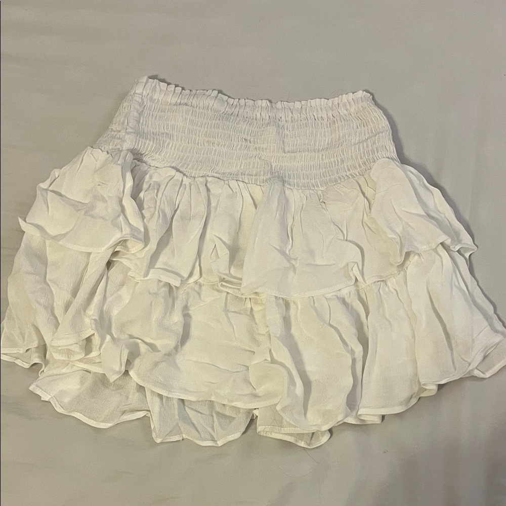Paradise USA white ruffled skirt
Size: Small